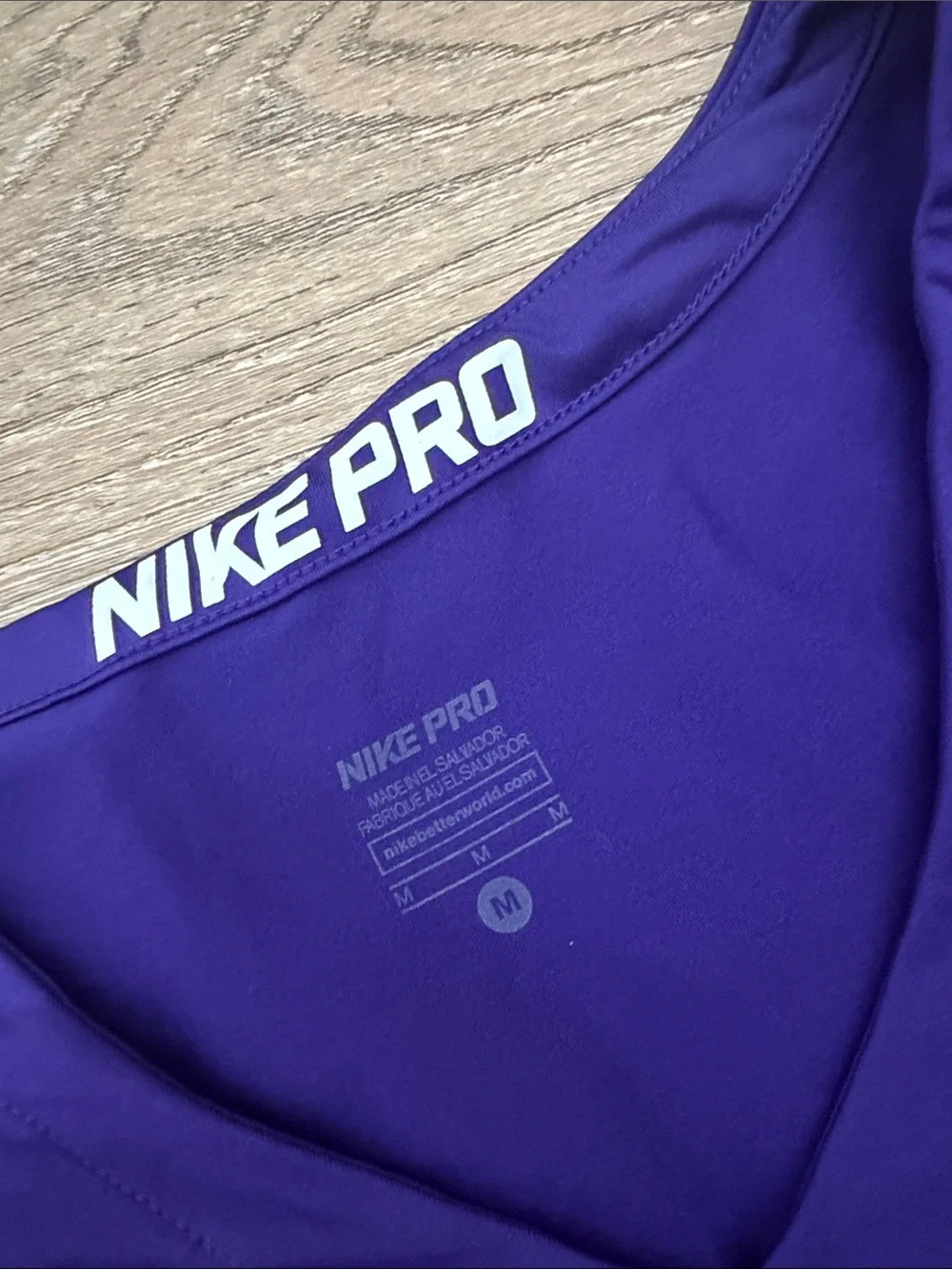 Nike Purple V-Neck Performance Top with White Swoosh